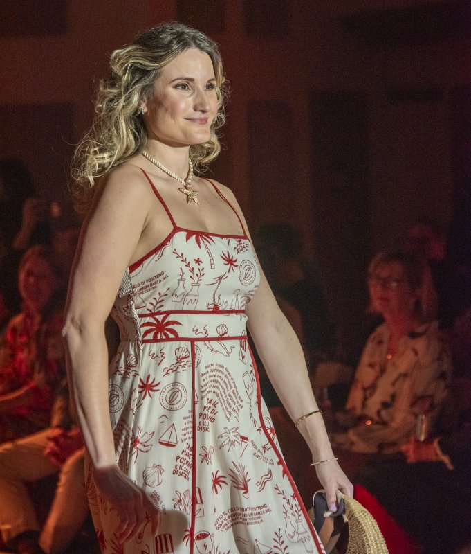 Layne Gable is ready for a day of shopping in her unique dress from MG Fashion.